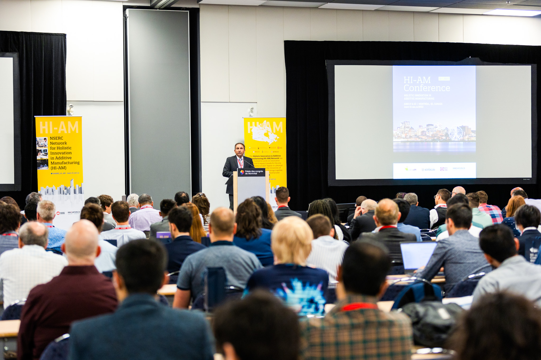 Audience looking at a presenter during the HI-AM 2022 in Montreal