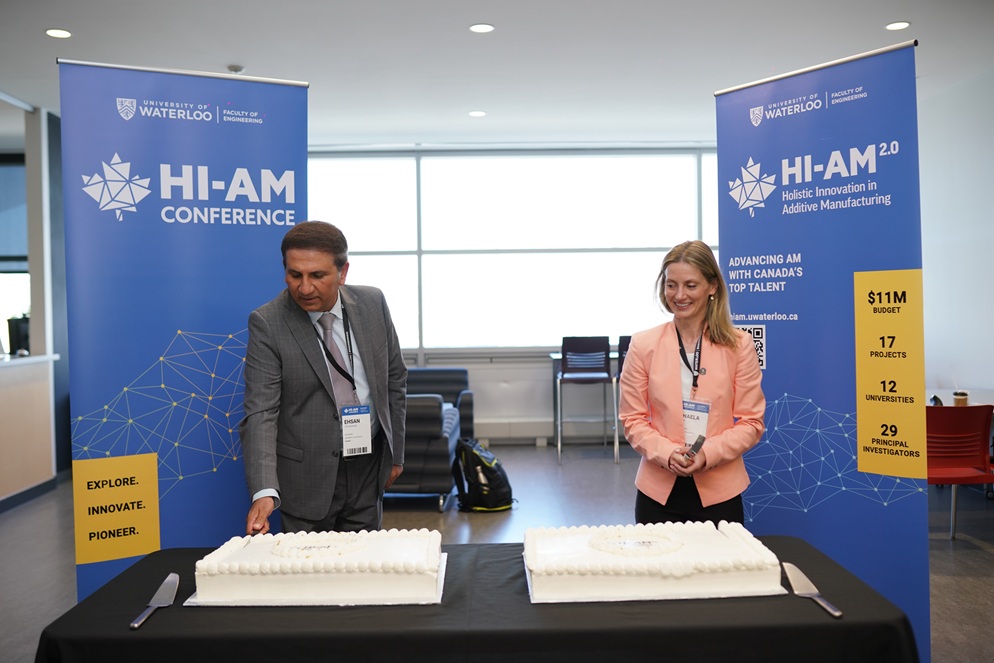 Celebration of the launch of HI-AM 2.0 with a cake-cutting ceremony